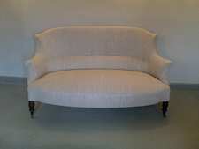 An antique upholstered sofa