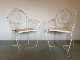 A pair of French garden chairs