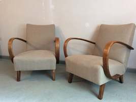 A pair of jindrich halabala armchairs