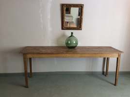 A long narrow French serving table