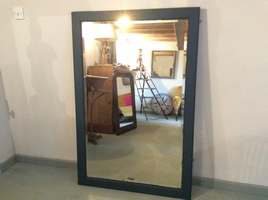 A large plain wall mirror