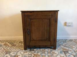 An 18thC oak floor standing cupboard