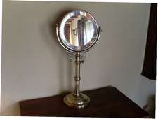An interesting brass shaving mirror