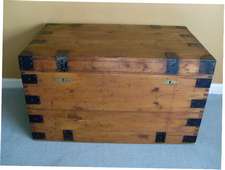 A 19thC pitch pine and iron trunk