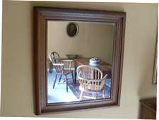 A Victorian oak mirror