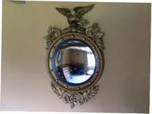 A regency convex wall mirror