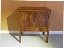 A 19thC 2 drawer bedside stand