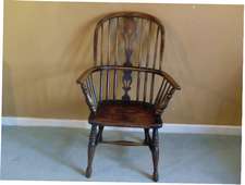 A 19thC ash and elm windsor chair