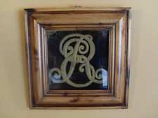 A framed Royal Cypher