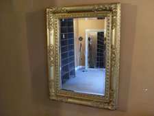 A Victorian gilded wall mirror
