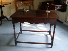 An 18thC or earlier oak hall table