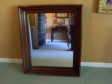 A large Victorian oak framed mirror