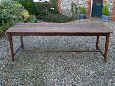 A large 3 plank top French farmhouse table