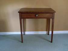 A Georgian side table with drawer