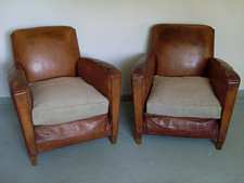 A pair of french leather club chairs