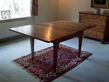 An 18thC walnut French dining table
