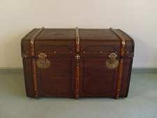 An antique LV style trunk