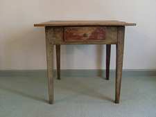A low French sycamore table