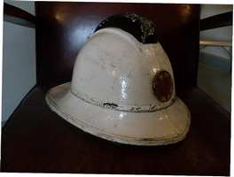 A vintage firemans helmet