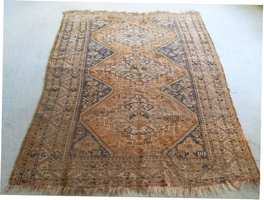 A worn vintage rug
