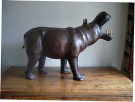 A Vintage leather hippo foot stool