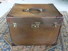 An Edwardian canvas and leather hat box