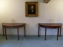 A pair of Georgian demilune tables