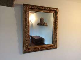 An Italian Florentine style mirror