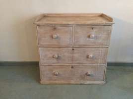 A Victorian lime waxed chest of drawers