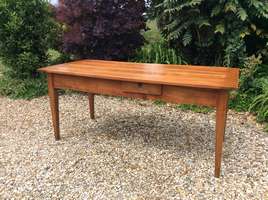 A French cherry dining table