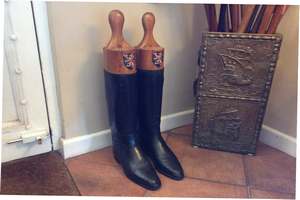 A pair of decorative riding boots