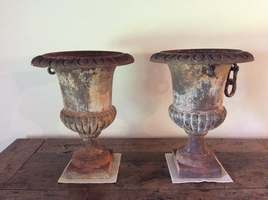 A pair of 19thc balustrade urns