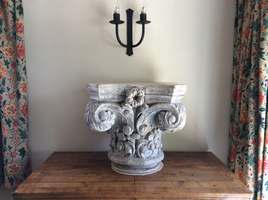 A 19thC carved wood capital