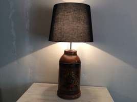 An antique tea canister lamp