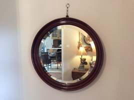 A large circular edwardian mirror