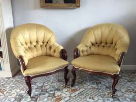 A near pair of 19thC upholstered armchairs
