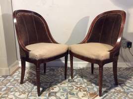 A pair of French hall chairs