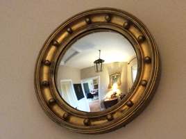 A 19thC convex wall mirror