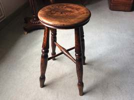 A 19thC elm stool