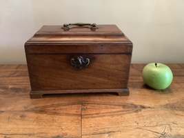 A Geo III tea caddy with secret drawer