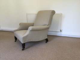 An English upholstered armchair