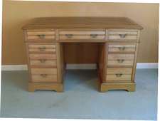 A good Edwardian light oak desk